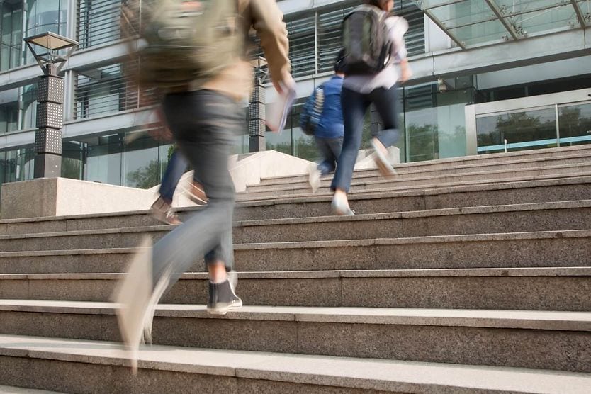 Blurry and shaky view of people walking due to the condition oscillopsia Blurry and shaky view of people walking due to the condition oscillopsia